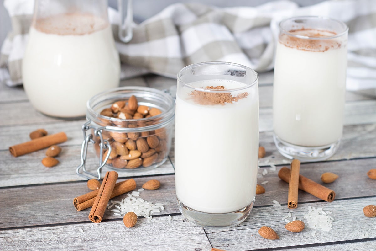 This authentic Horchata recipe has everything you need: rice, almonds, cinnamon, and lime zest mixed together to create a creamy, refreshing, thirst-quenching Mexican drink! | cookingtheglobe.com