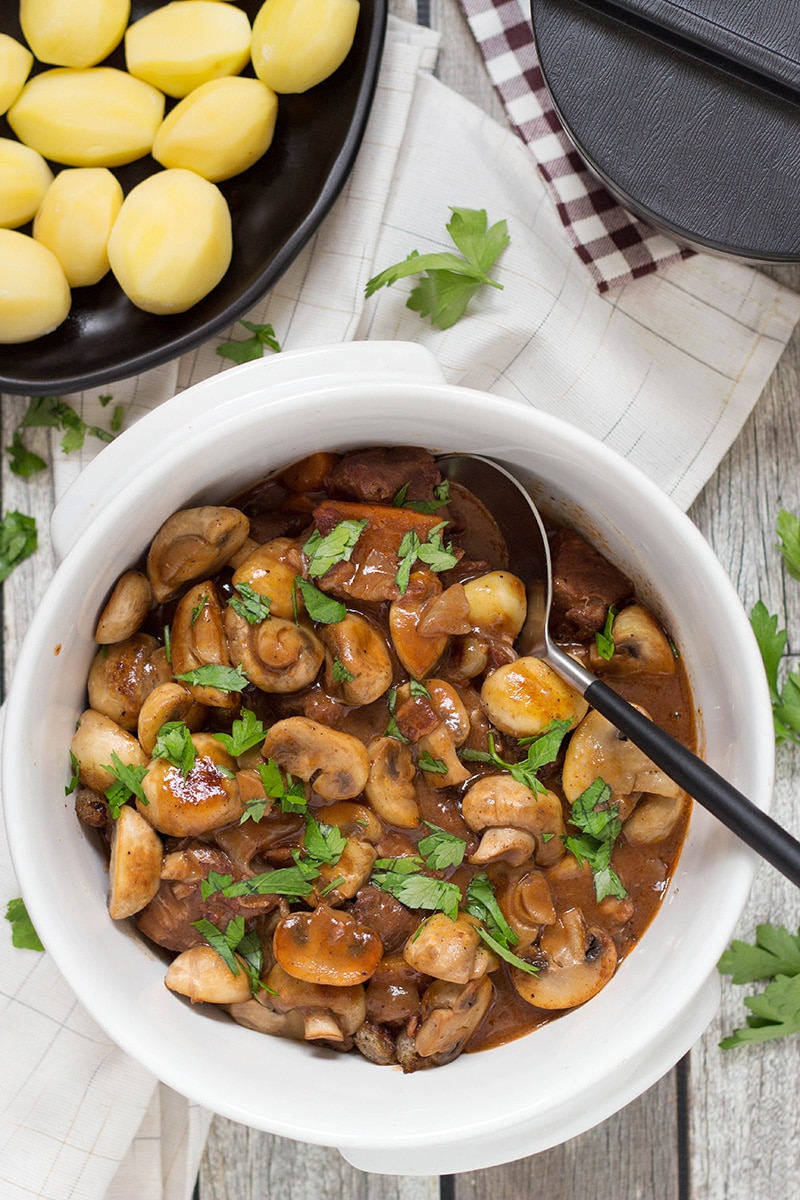 Boeuf Bourguignon is a traditional French beef stew with mushrooms, onions, and other goodies. Try this classic recipe brought by the legendary Julia Child! | cookingtheglobe.com