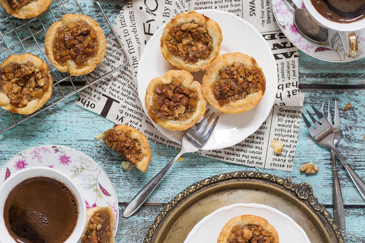 Butter Tarts are the traditional Canadian dessert. These little cute treats are sweet and buttery. One of the best desserts I have ever tried! | cookingtheglobe.com