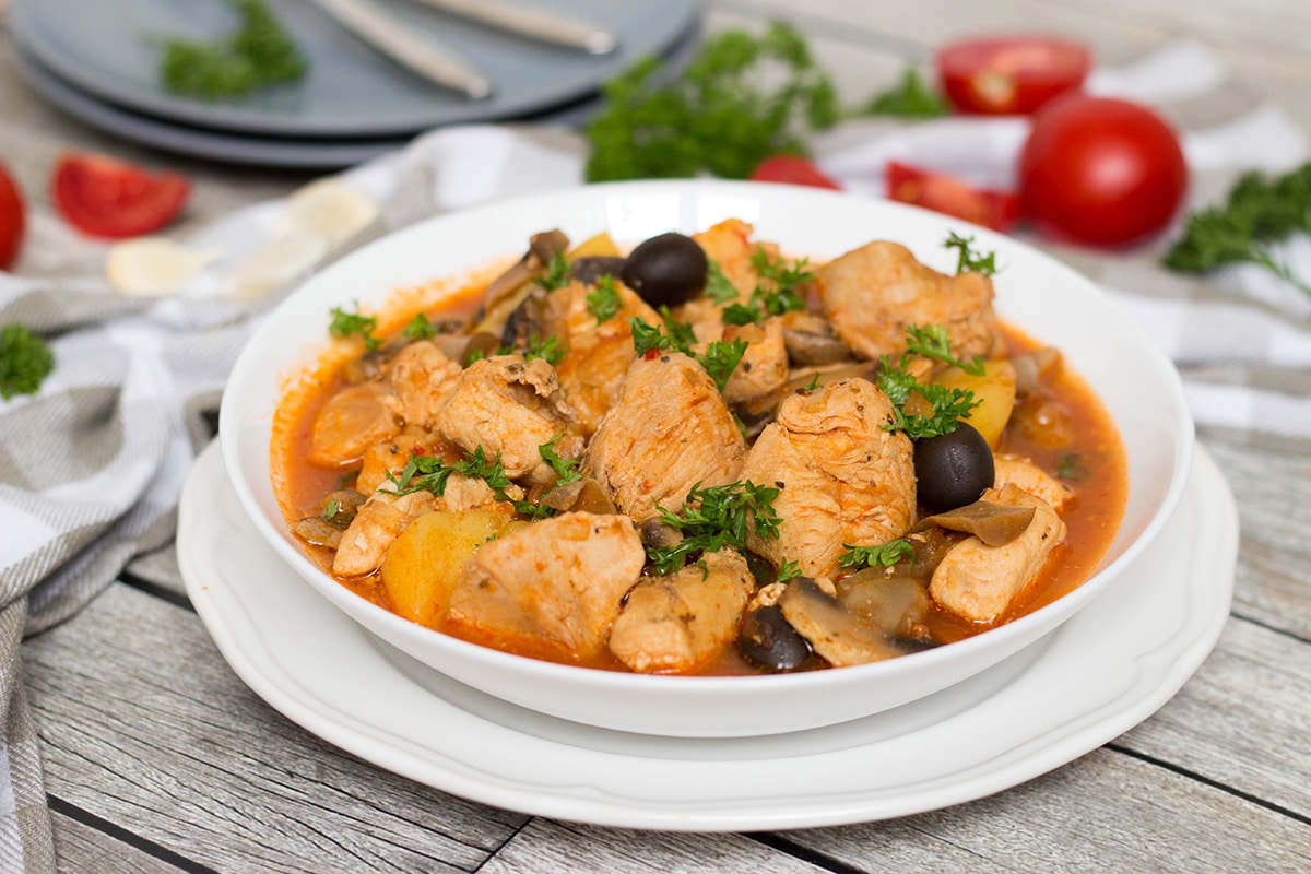 This traditional Puerto Rican Chicken Stew (Pollo Guisado) is easy and quick to make. Perfect as a weeknight dinner! | cookingtheglobe.com