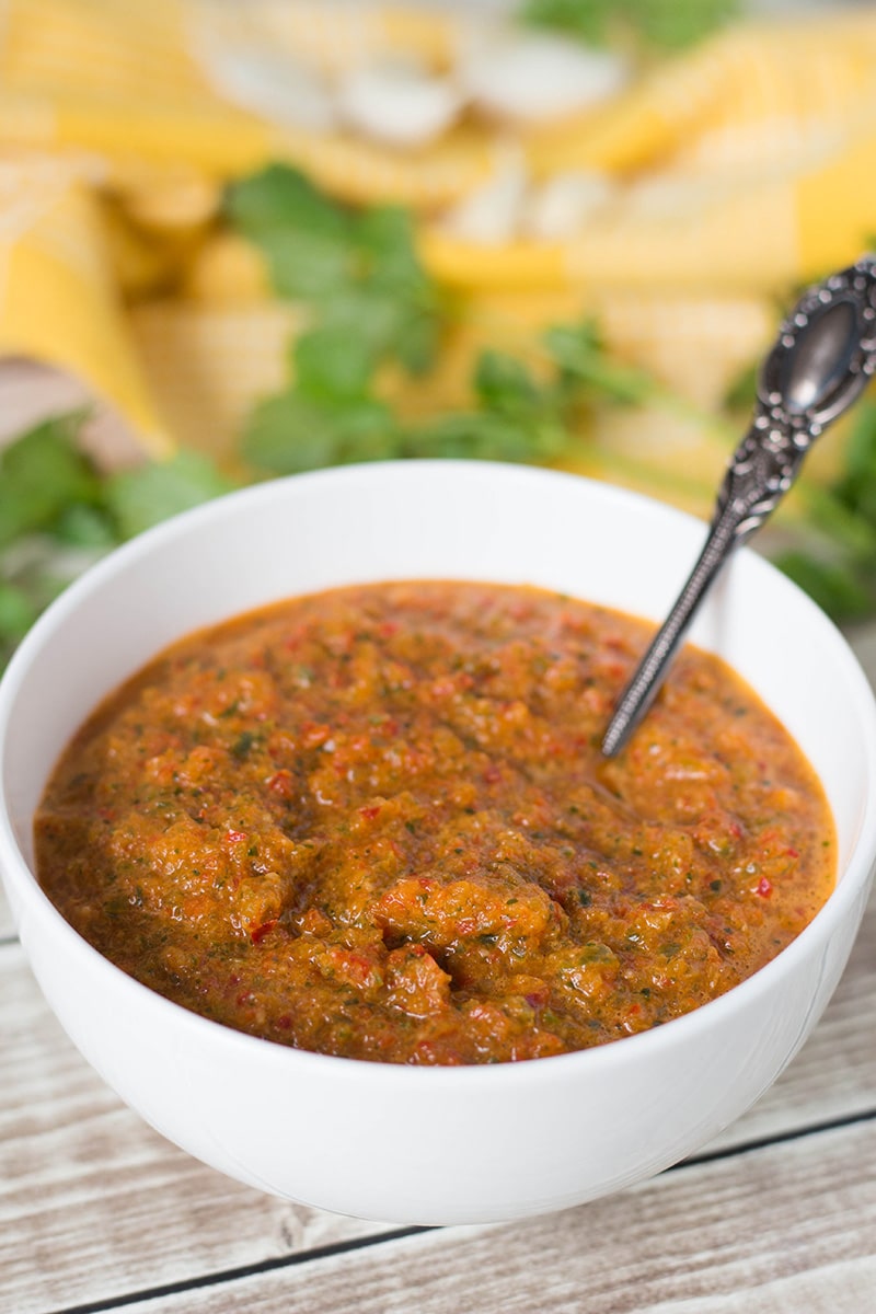 If you have never tried Puerto Rican Sofrito, you don't know what you are missing. This combination of peppers, cilantro, garlic, and onion can be used as a base in many Caribbean dishes! | cookingtheglobe.com