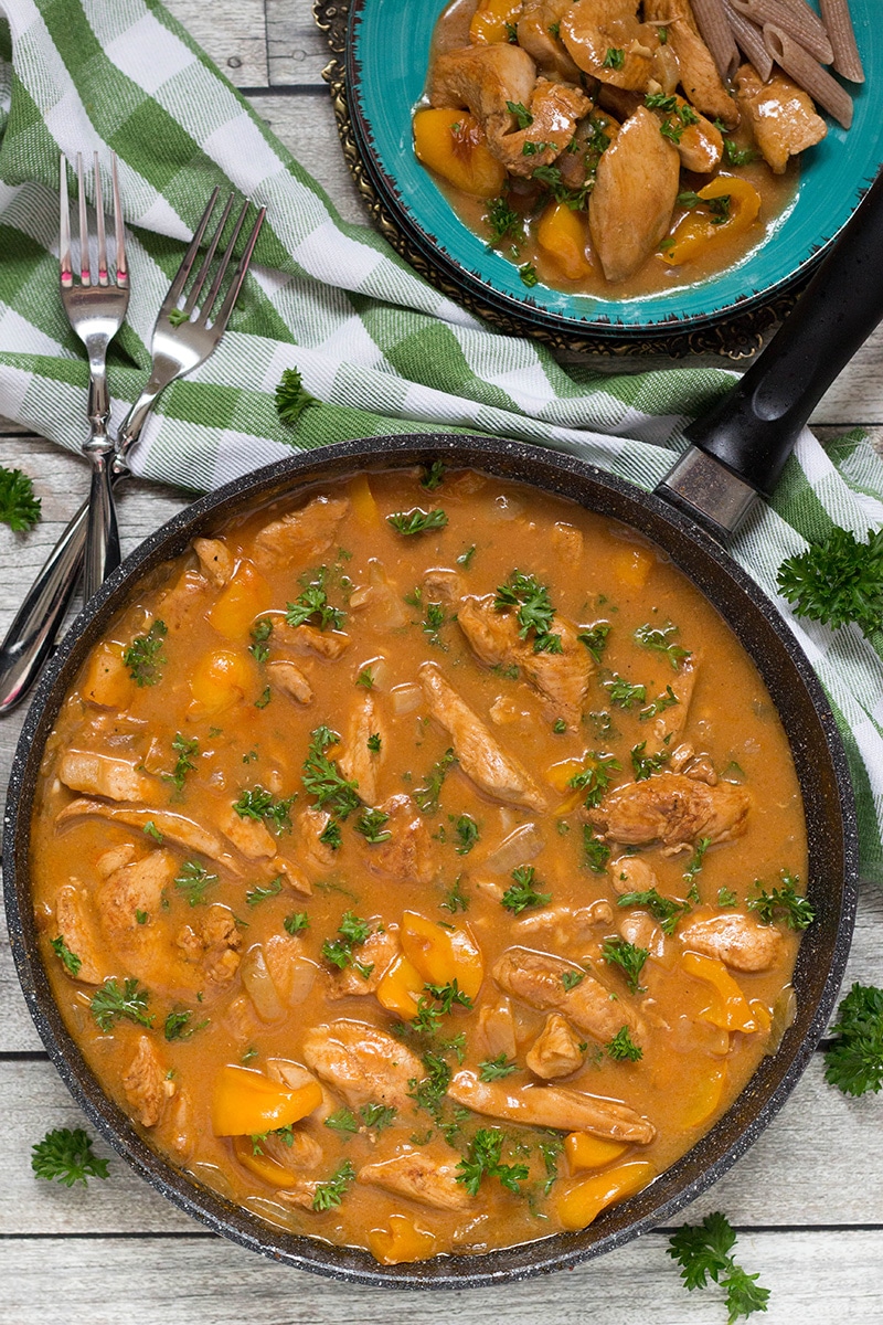 Hungarian Chicken Paprikash is basically a paprika flavored chicken. This dish is really easy to make and makes a fabulous weeknight dinner! | cookingtheglobe.com