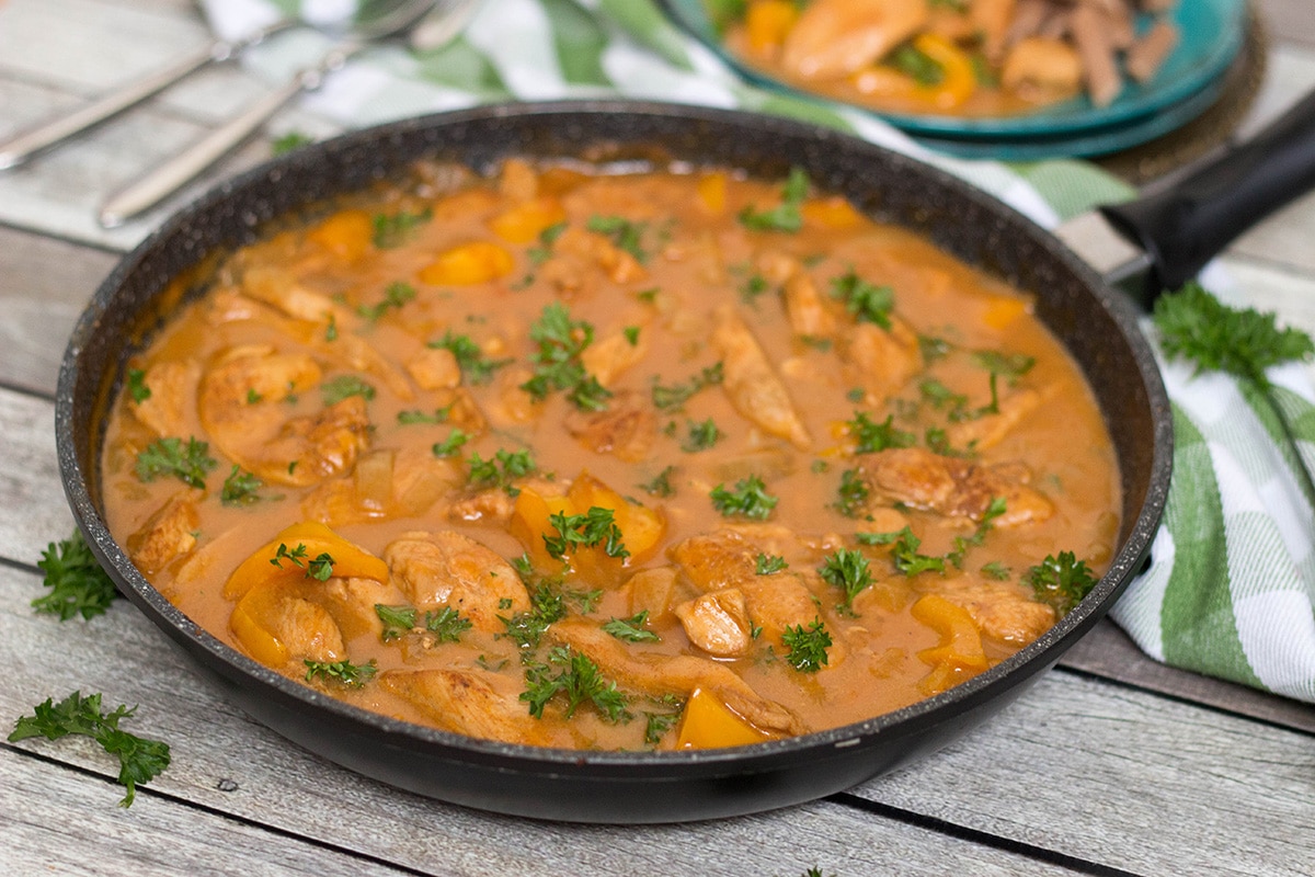 Hungarian Chicken Paprikash is basically a paprika flavored chicken. This dish is really easy to make and makes a fabulous weeknight dinner! | cookingtheglobe.com