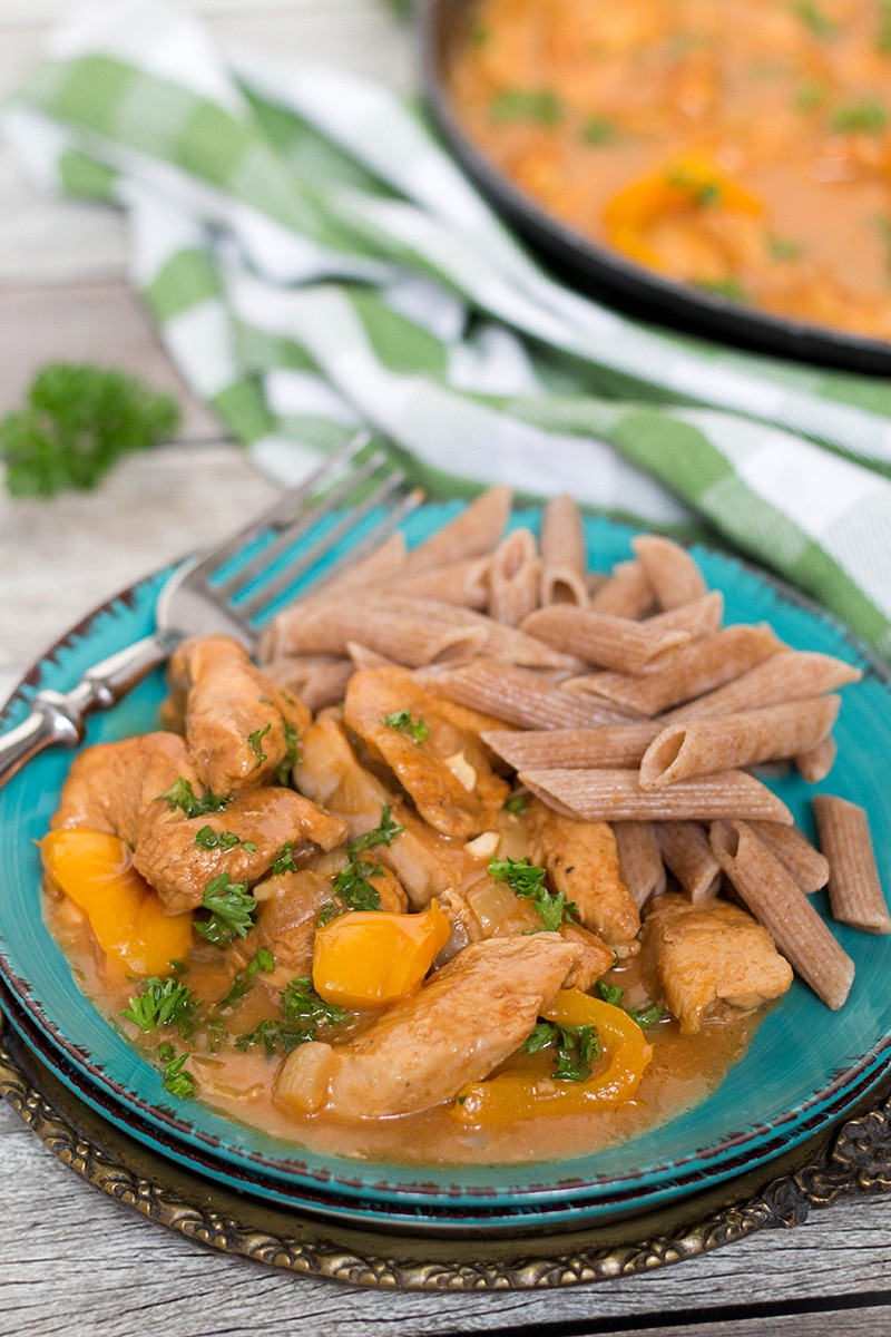 Hungarian Chicken Paprikash is basically a paprika flavored chicken. This dish is really easy to make and makes a fabulous weeknight dinner! | cookingtheglobe.com