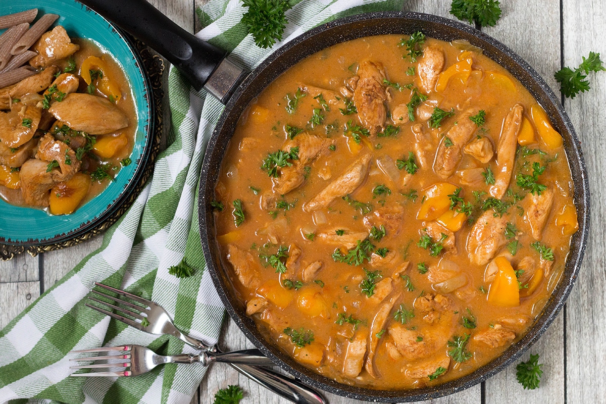 Hungarian Chicken Paprikash is basically a paprika flavored chicken. This dish is really easy to make and makes a fabulous weeknight dinner! | cookingtheglobe.com