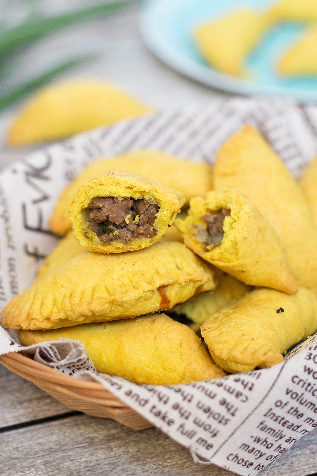 These flaky Jamaican Beef Patties are filled with a spicy ground beef mixture flavored with onion, thyme, pepper, and curry. Perfect on-the-go snack any time of the day! | cookingtheglobe.com