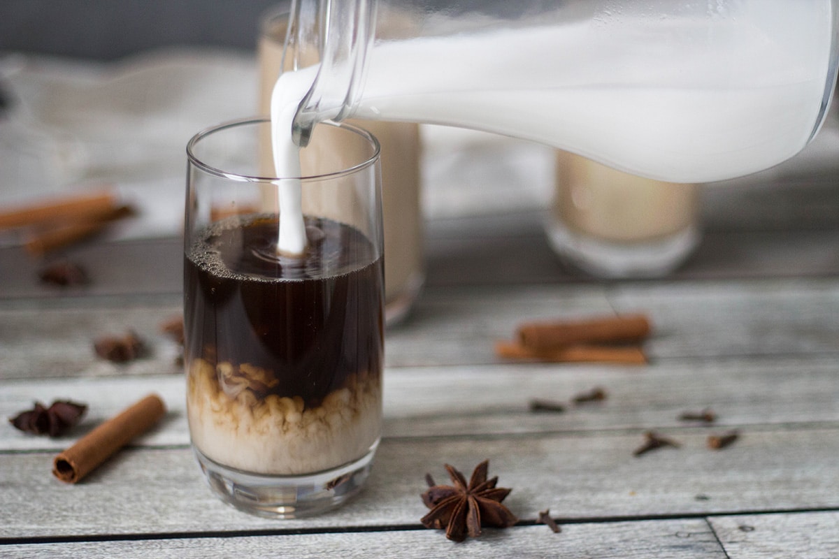 If you are looking for something refreshing and crazy delicious at the same time, this Thai Iced Tea is for you. It's flavored with anise, cinnamon, ginger, cloves, and more! | cookingtheglobe.com