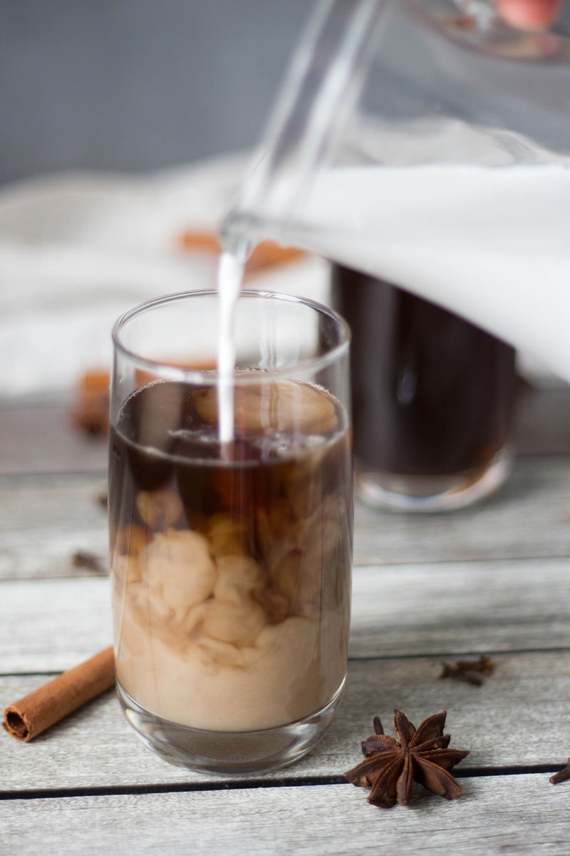 If you are looking for something refreshing and crazy delicious at the same time, this Thai Iced Tea is for you. It's flavored with anise, cinnamon, ginger, cloves, and more! | cookingtheglobe.com