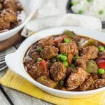 Beef Caldereta is a tomato sauce, red wine, and soy sauce based stew coming from the Philippines. But what sets it apart from other stews is the addition of liver pâté! Intrigued? Check it out! | cookingtheglobe.com