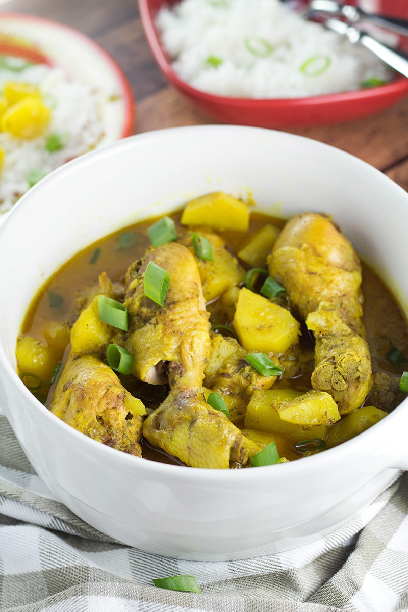 If you love Caribbean cuisine, this Jamaican Curry Chicken will make your taste buds tingle. It's spicy, it's comforting, it's everything you want a dish to be. Yum! | cookingtheglobe.com