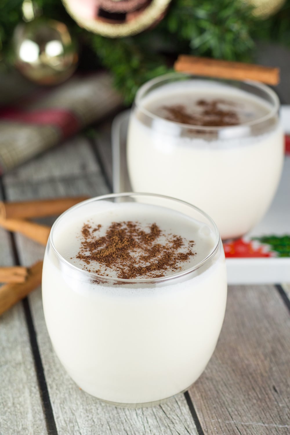 Learn how to make Coquito (Puerto Rican Eggnog) at home and make your Christmas or any other holiday unforgettable. Rich, creamy, boozy! | cookingtheglobe.com