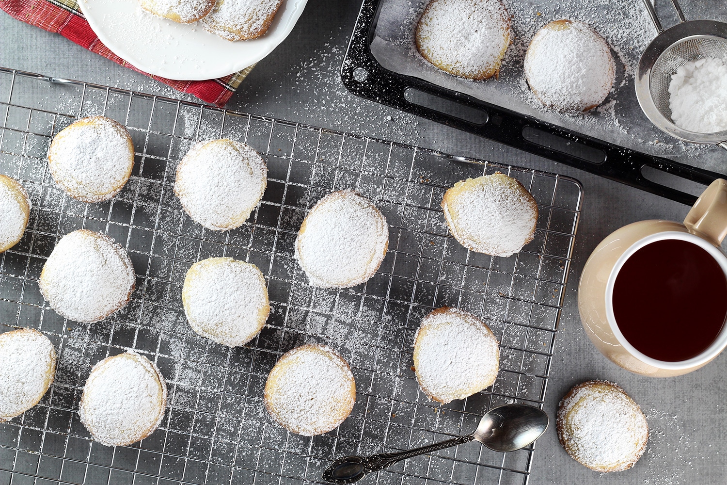 These Greek Butter Cookies (Kourabiedes) are usually made on Christmas or other holidays. They are tender, buttery, and stuffed with pistachios! | cookingtheglobe.com