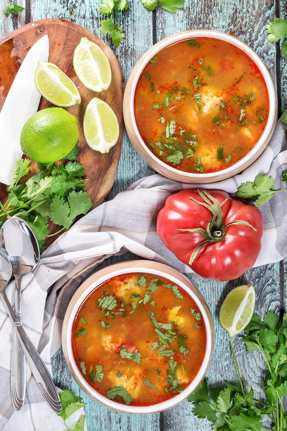 This amazing Mexican Shrimp Soup features super tender shrimp meatballs swimming in a flavorful spicy tomato broth. So easy and quick to make! | cookingtheglobe.com