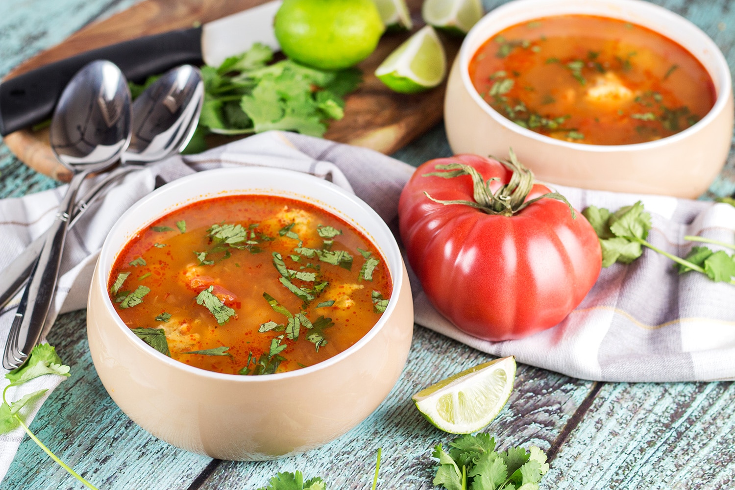 This amazing Mexican Shrimp Soup features super tender shrimp meatballs swimming in a flavorful spicy tomato broth. So easy and quick to make! | cookingtheglobe.com