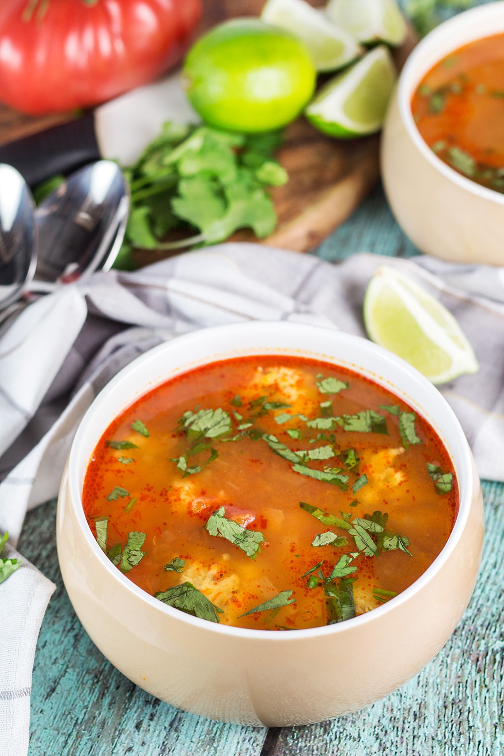 This amazing Mexican Shrimp Soup features super tender shrimp meatballs swimming in a flavorful spicy tomato broth. So easy and quick to make! | cookingtheglobe.com