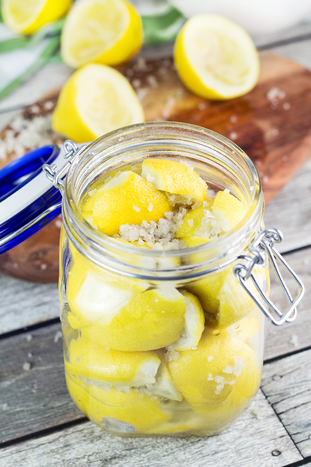 Moroccan Preserved Lemons are a must in every kitchen pantry. They require only 2 ingredients to make and can be used in an array of dishes! | cookingtheglobe.com