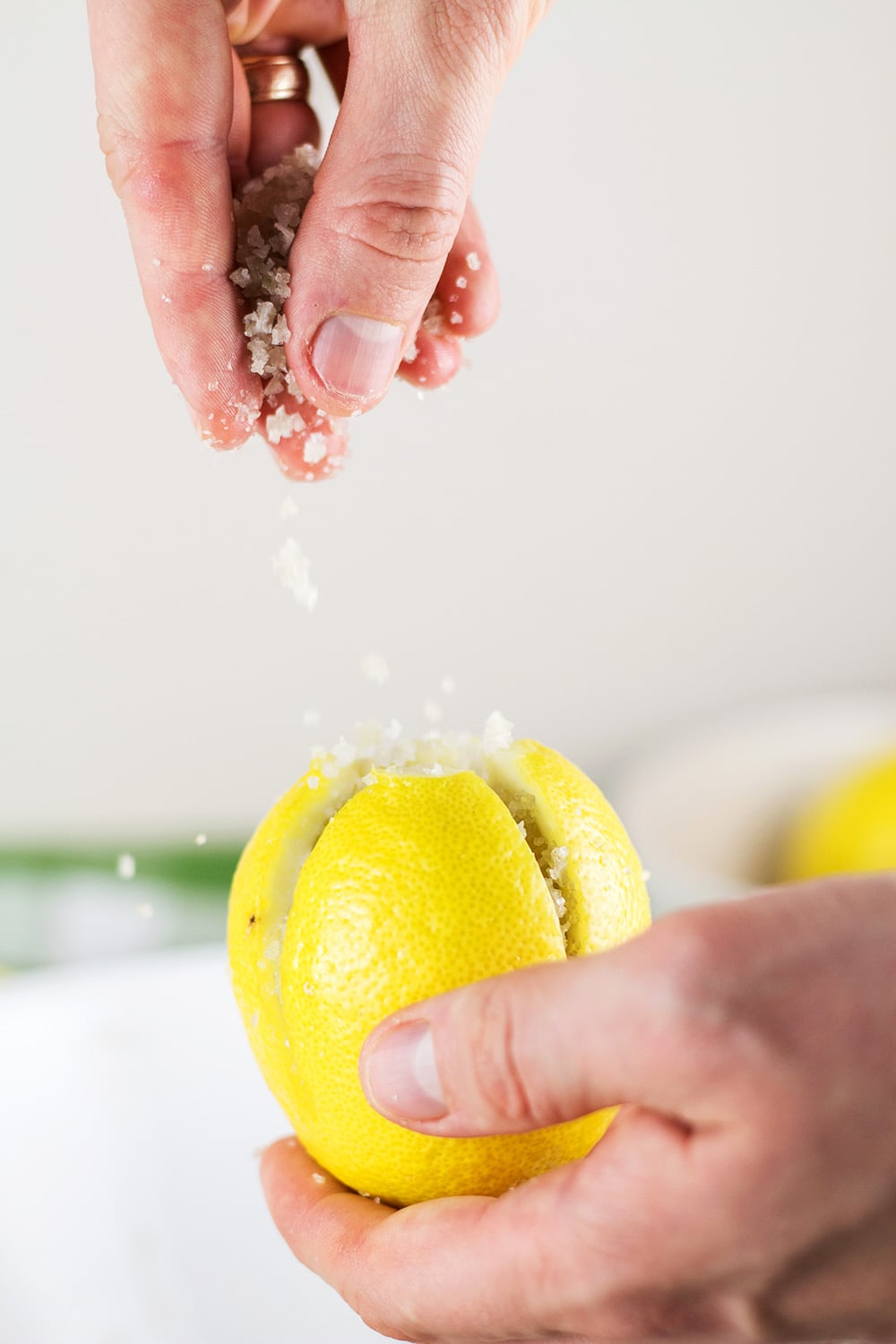 Moroccan Preserved Lemons are a must in every kitchen pantry. They require only 2 ingredients to make and can be used in an array of dishes! | cookingtheglobe.com