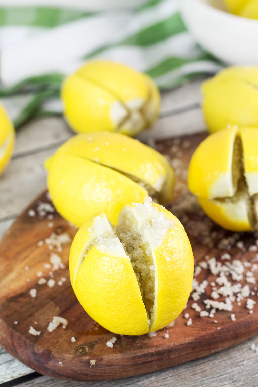 Moroccan Preserved Lemons are a must in every kitchen pantry. They require only 2 ingredients to make and can be used in an array of dishes! | cookingtheglobe.com