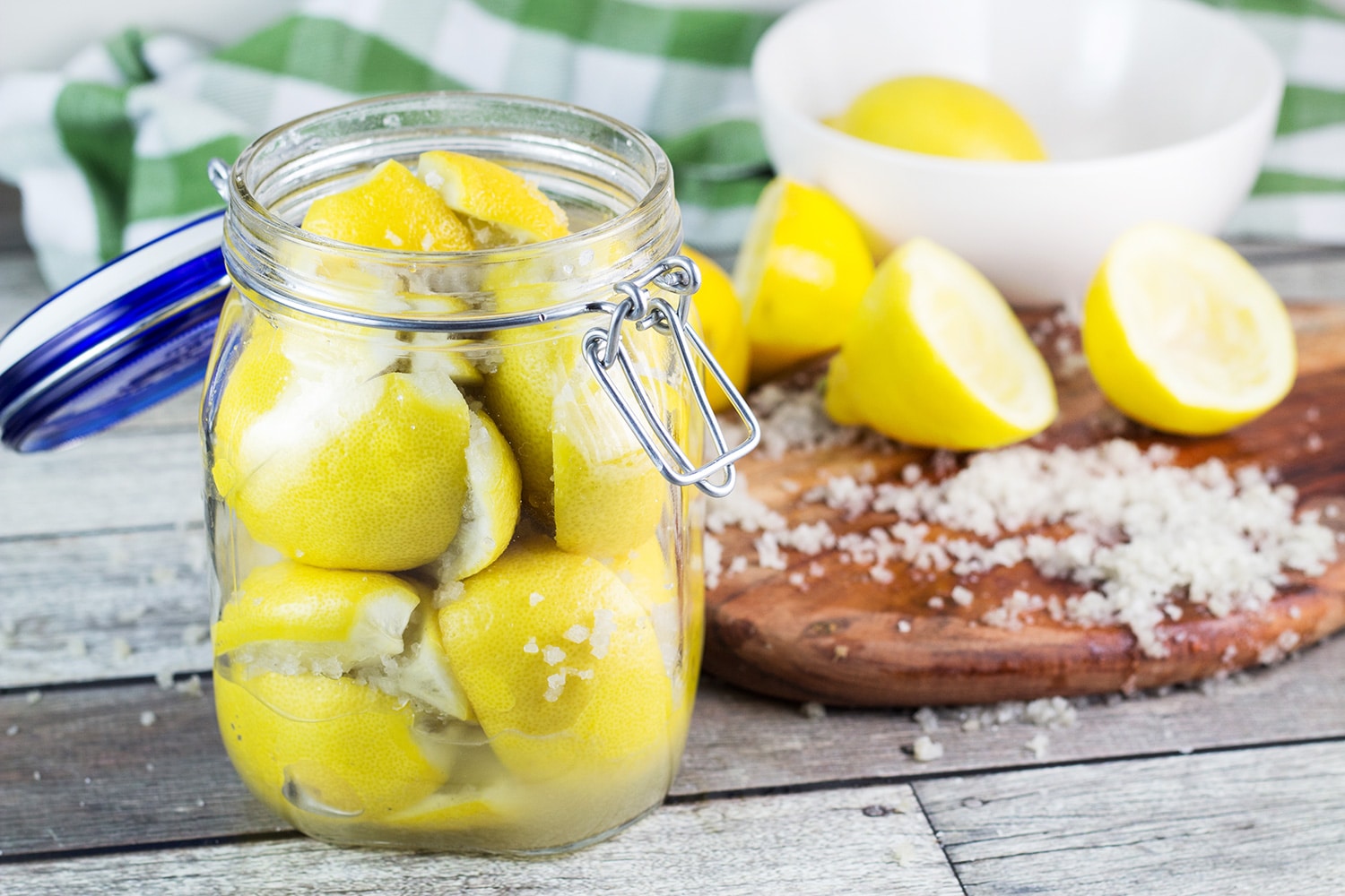 Moroccan Preserved Lemons are a must in every kitchen pantry. They require only 2 ingredients to make and can be used in an array of dishes! | cookingtheglobe.com