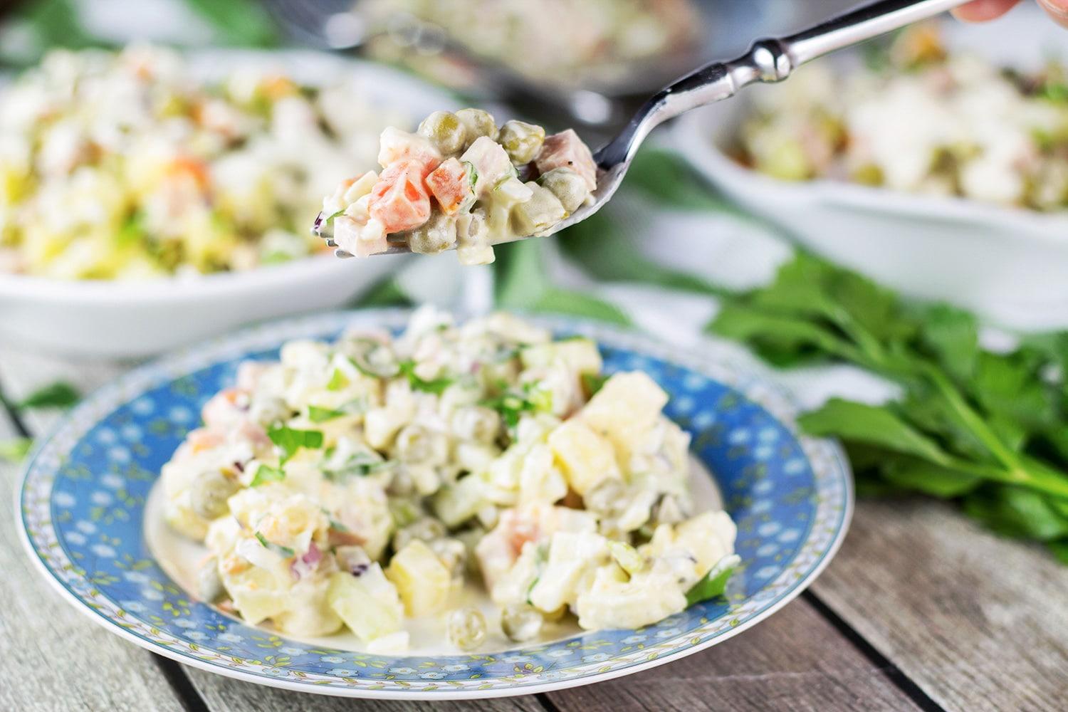 Olivier Salad, also known as Russian Potato Salad, is one of the most famous Russian foods. It is hearty, comforting, filling, and super delicious! | cookingtheglobe.com