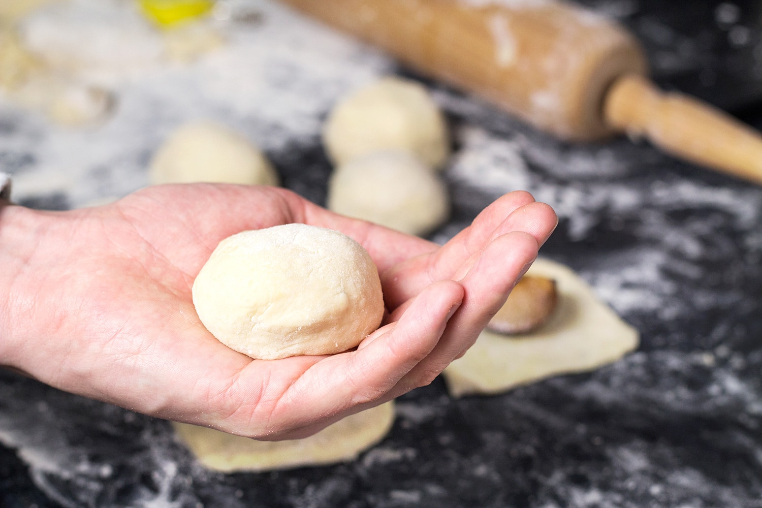 If you love gnocchi, you have to try these Hungarian Plum Dumplings! Made with mashed potatoes and featuring a plum inside, they make a great dessert or a side dish! | cookingtheglobe.com