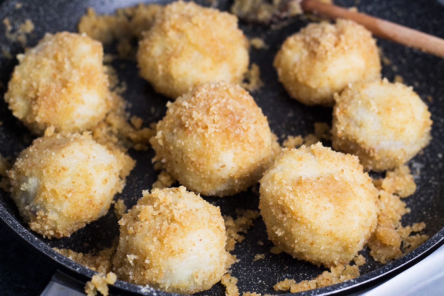 If you love gnocchi, you have to try these Hungarian Plum Dumplings! Made with mashed potatoes and featuring a plum inside, they make a great dessert or a side dish! | cookingtheglobe.com