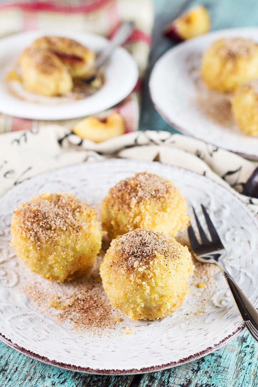 If you love gnocchi, you have to try these Hungarian Plum Dumplings! Made with mashed potatoes and featuring a plum inside, they make a great dessert or a side dish! | cookingtheglobe.com