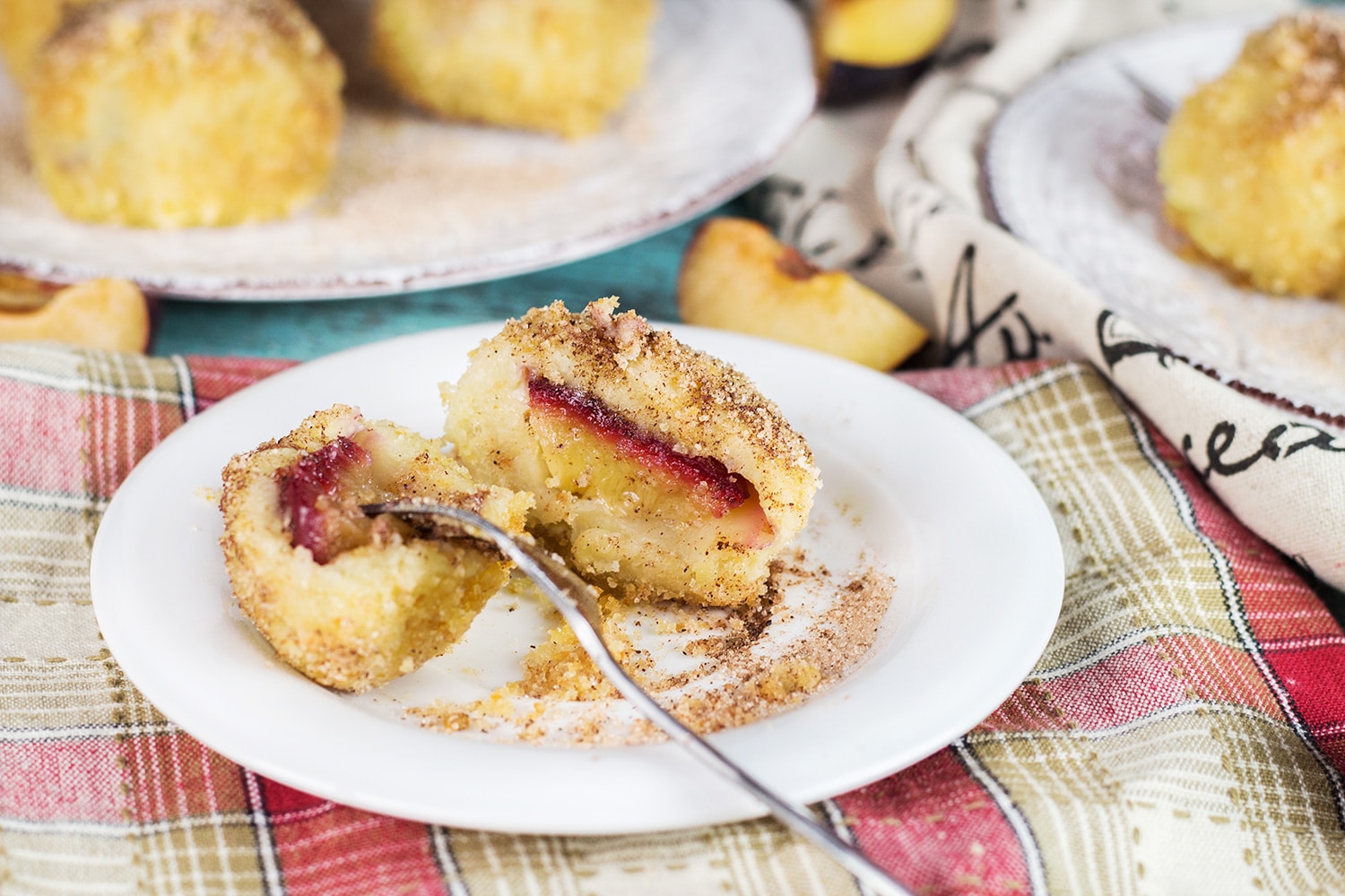 If you love gnocchi, you have to try these Hungarian Plum Dumplings! Made with mashed potatoes and featuring a plum inside, they make a great dessert or a side dish! | cookingtheglobe.com