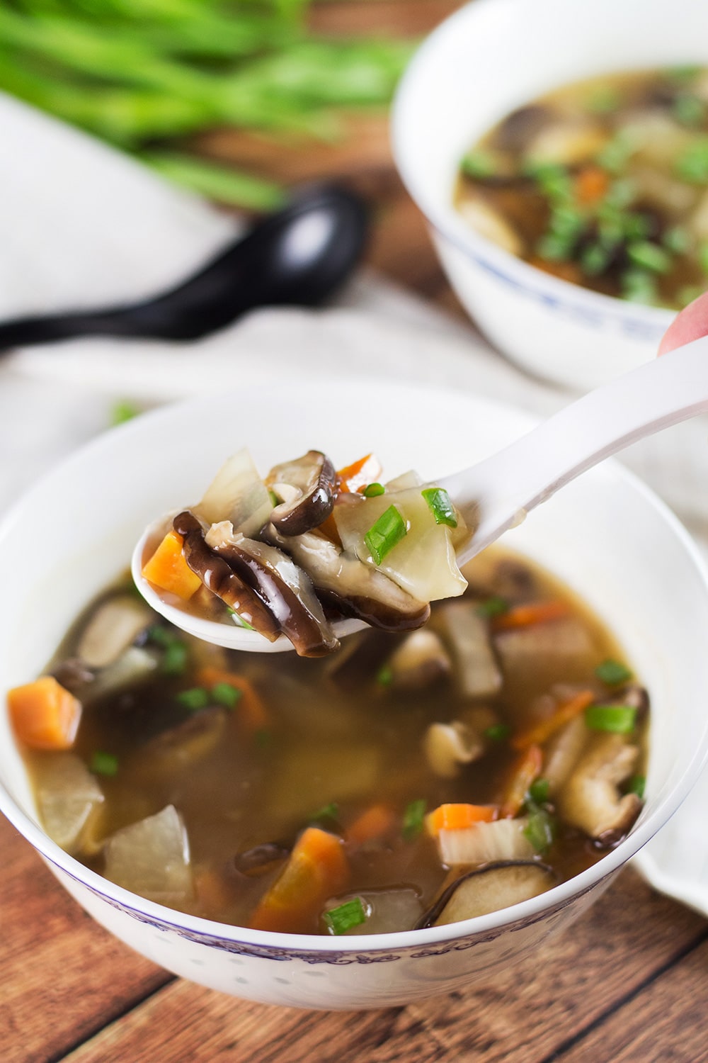 This Japanese Clear Soup uses a flavorful dashi stock as a base and also features shiitake mushrooms and a bunch of veggies! A perfect appetizer or a light lunch! | cookingtheglobe.com