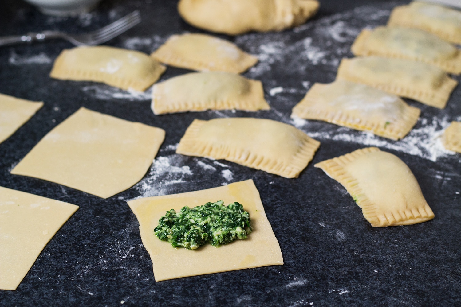 Maultaschen is a German version of Italian ravioli dumplings, only way bigger. This recipe features two different fillings: a traditional and a modern one! | cookingtheglobe.com