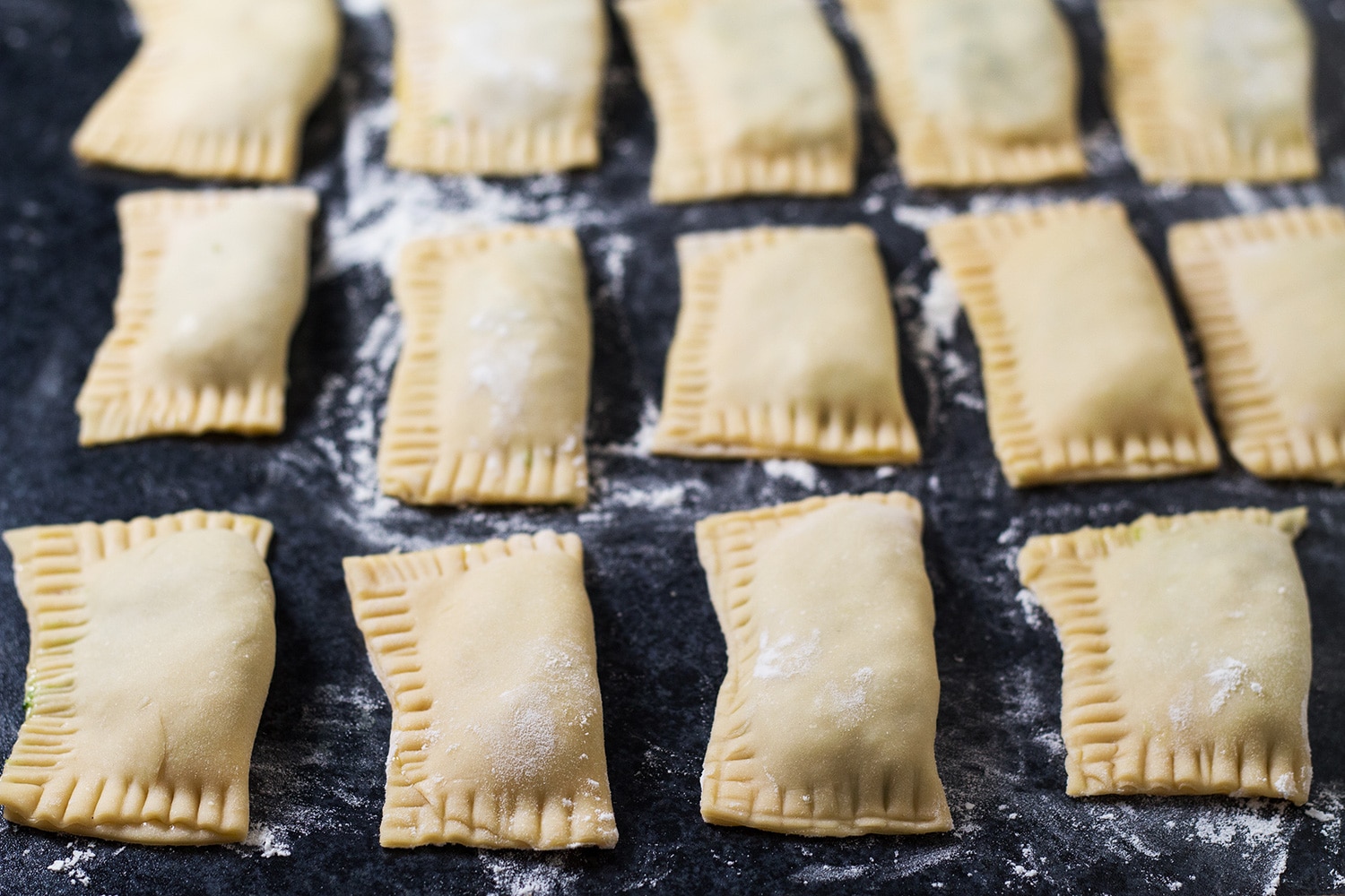 Maultaschen is a German version of Italian ravioli dumplings, only way bigger. This recipe features two different fillings: a traditional and a modern one! | cookingtheglobe.com