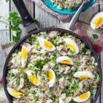 Kedgeree is a traditional British dish usually eaten for breakfast. Smoked fish, spiced rice, peas, onions, and hard-boiled eggs. A true flavor bomb! | cookingtheglobe.com