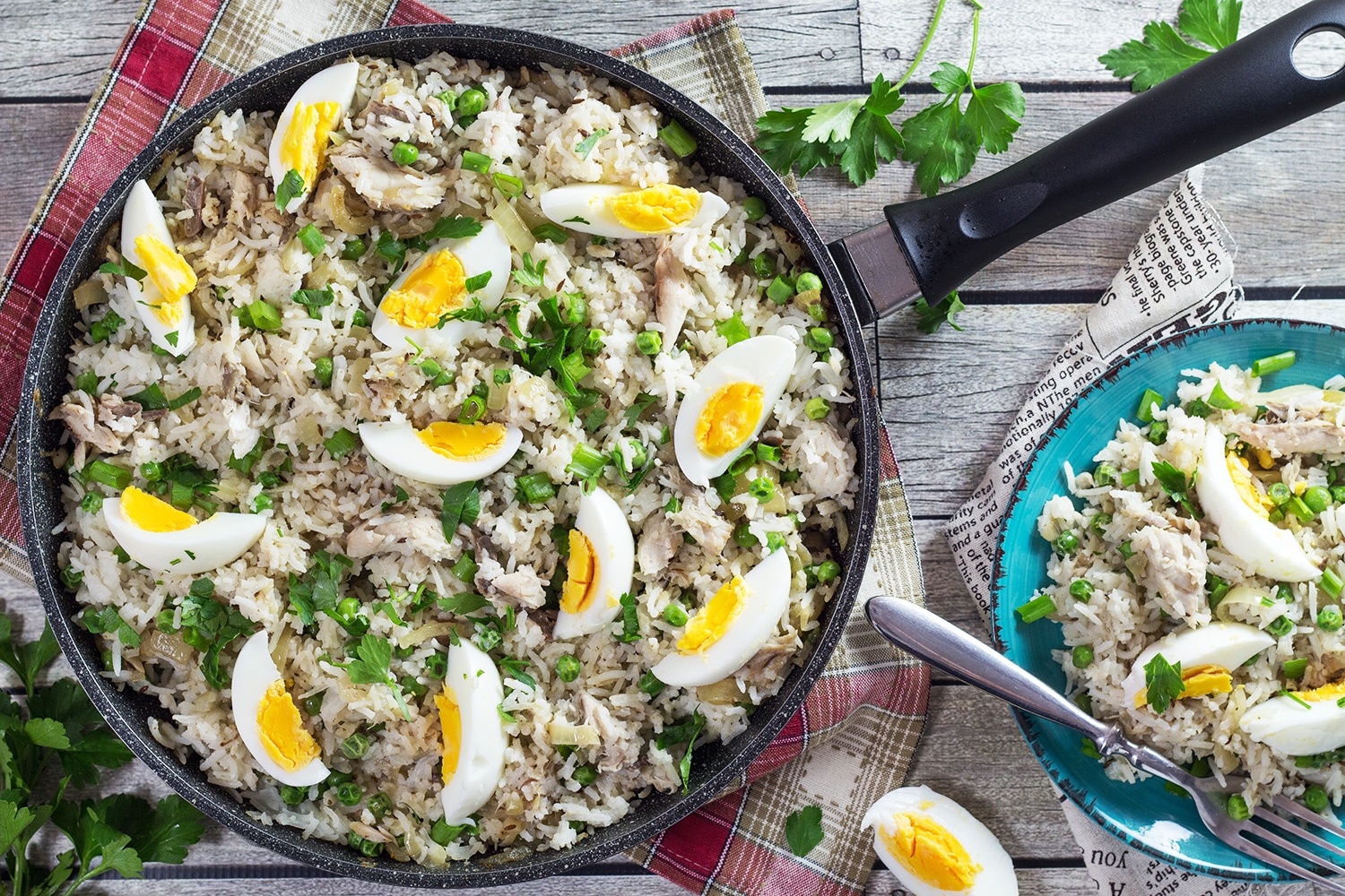 Kedgeree is a traditional British dish usually eaten for breakfast. Smoked fish, spiced rice, peas, onions, and hard-boiled eggs. A true flavor bomb! | cookingtheglobe.com