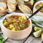 Soup Joumou is a traditional Haitian pumpkin soup packed with 11 different veggies, beef, and pasta. Hearty, comforting, and crazy delicious! | cookingtheglobe.com