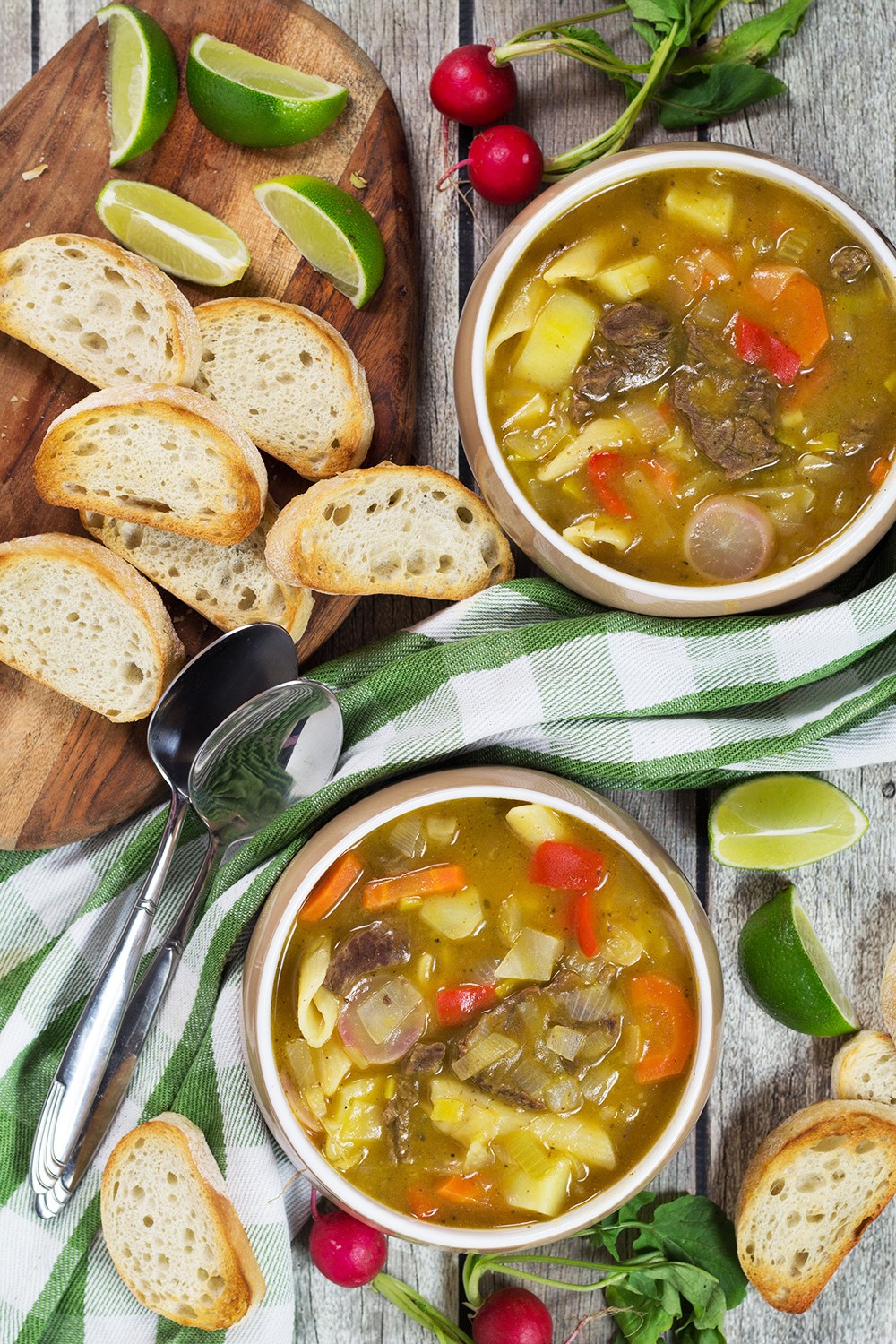 Soup Joumou is a traditional Haitian pumpkin soup packed with 11 different veggies, beef, and pasta. Hearty, comforting, and crazy delicious! | cookingtheglobe.com