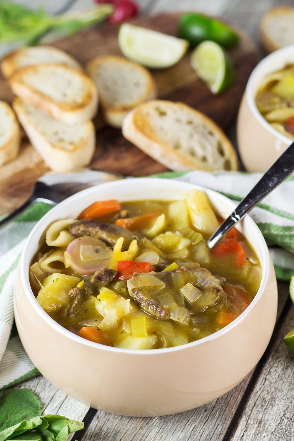 Soup Joumou is a traditional Haitian pumpkin soup packed with 11 different veggies, beef, and pasta. Hearty, comforting, and crazy delicious! | cookingtheglobe.com