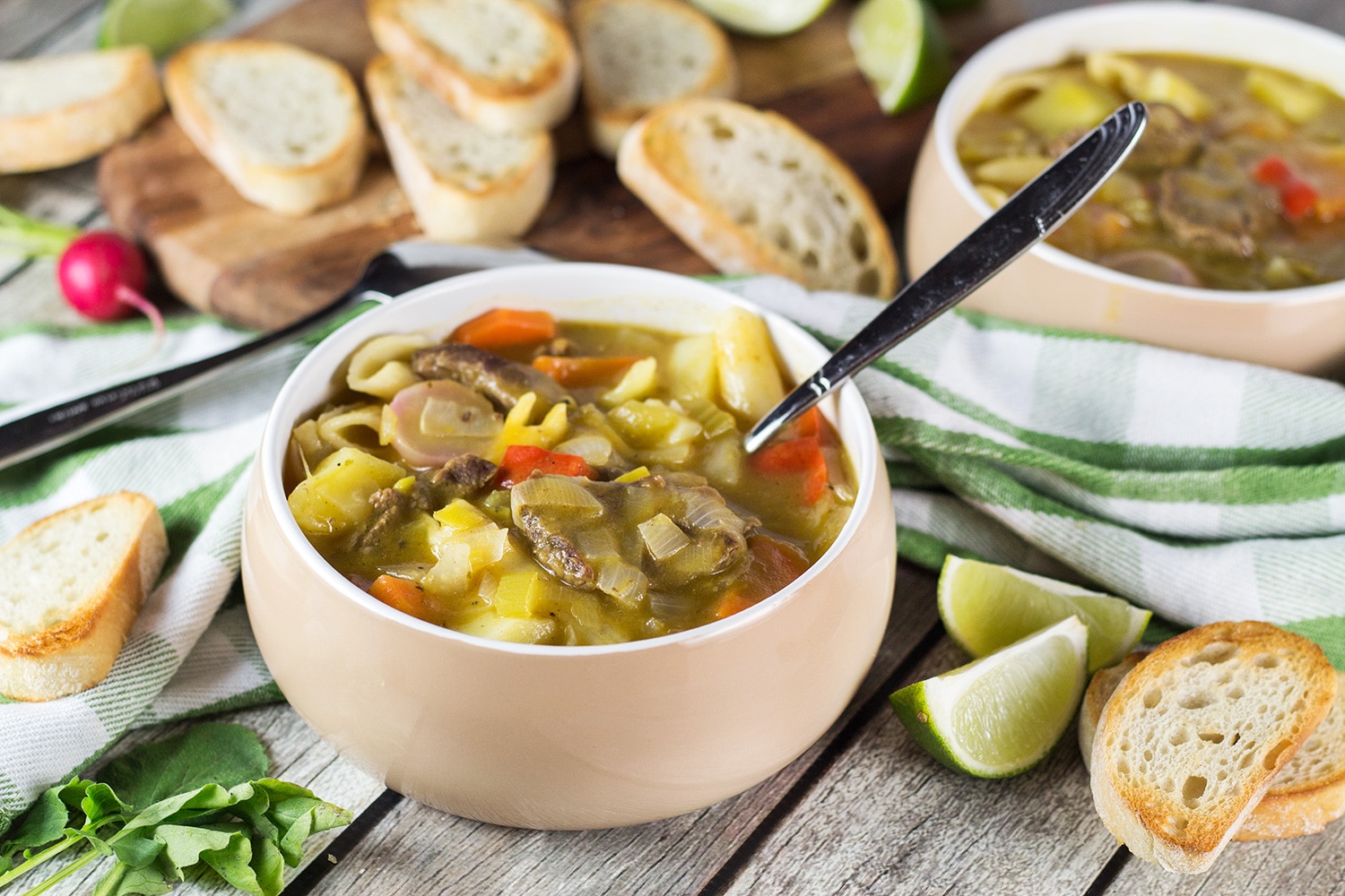 Soup Joumou is a traditional Haitian pumpkin soup packed with 11 different veggies, beef, and pasta. Hearty, comforting, and crazy delicious! | cookingtheglobe.com