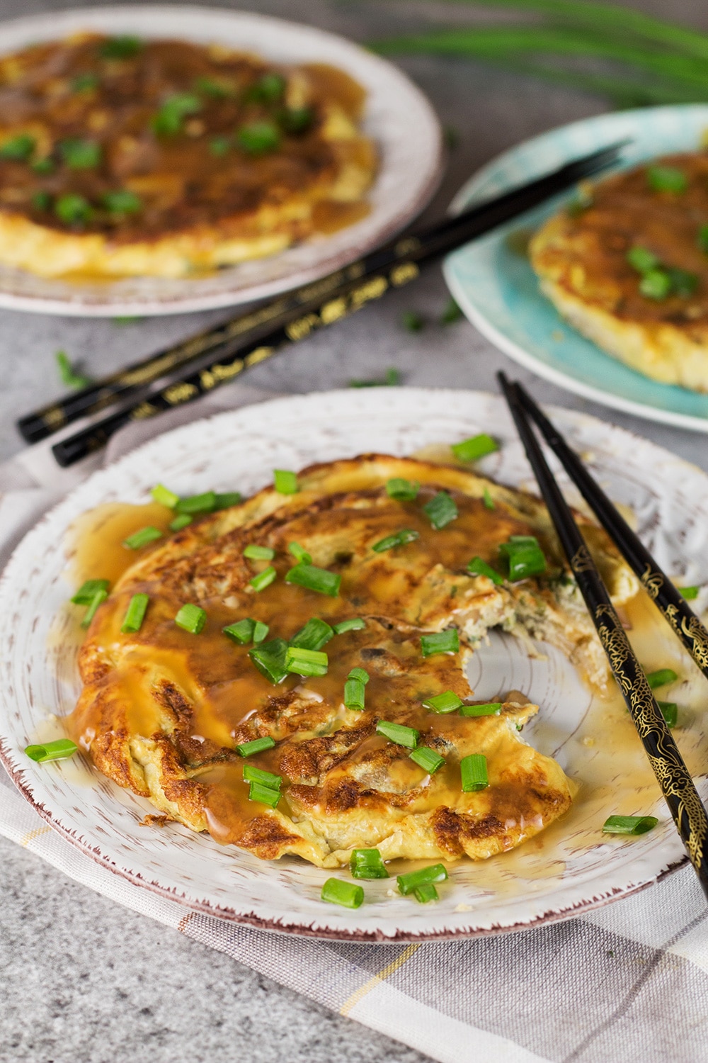 Vegetable Egg Foo Young is a perfect meatless Chinese-American breakfast option. Packed with bean sprouts, water chestnuts, and mushrooms! | cookingtheglobe.com