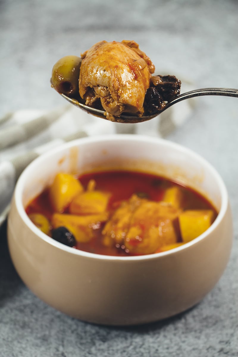 Fricase De Pollo is the famous Cuban chicken stew packed with tons of different flavors. A great stew the whole family will love! | cookingtheglobe.com