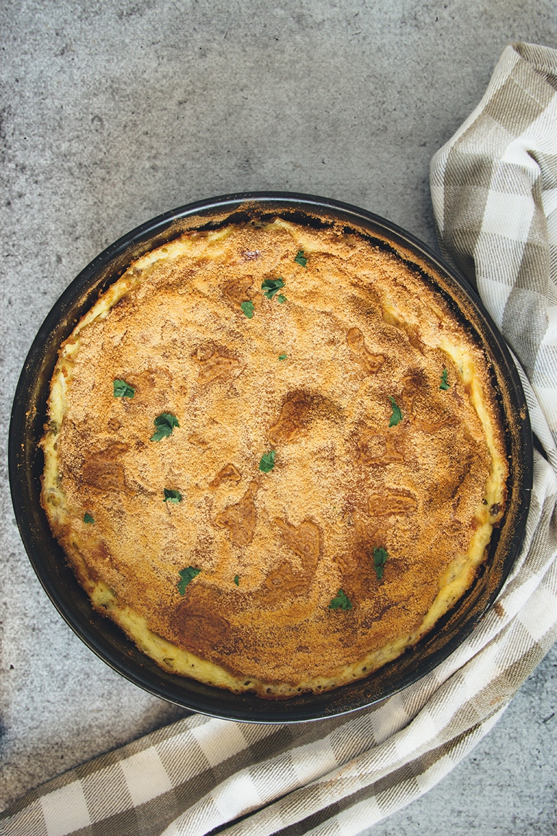 This Italian mashed potato pie is creamy, comforting, and crazy delicious. Featuring three types of cheese and two types of meat, it makes a great side or even a main dish! | cookingtheglobe.com