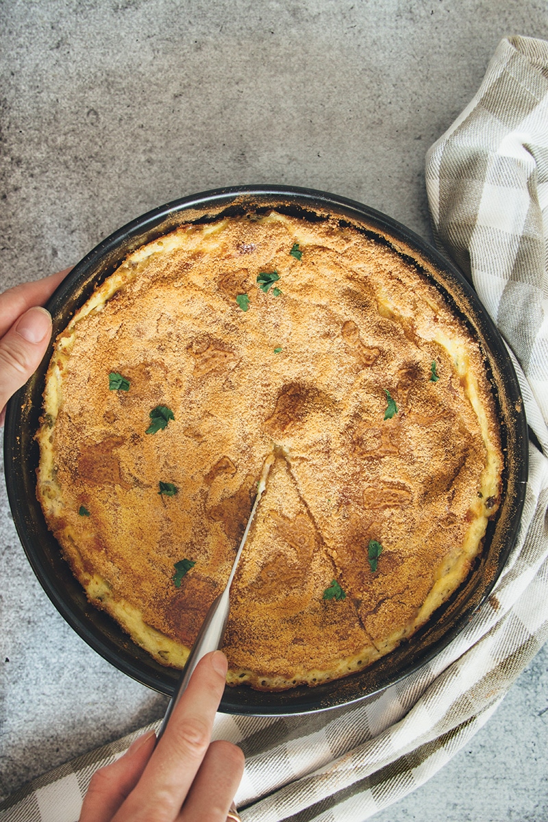 This Italian mashed potato pie is creamy, comforting, and crazy delicious. Featuring three types of cheese and two types of meat, it makes a great side or even a main dish! | cookingtheglobe.com