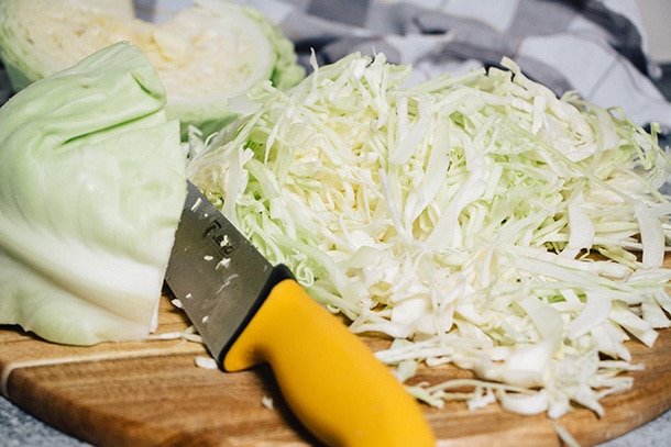 Thinly slicing fresh cabbage