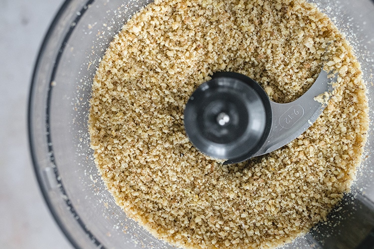 Grinding walnuts in a food processor