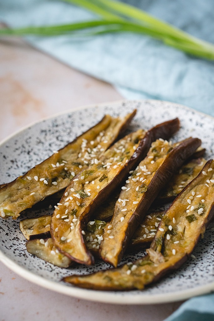 Roasted Japanese eggplant served on a plate