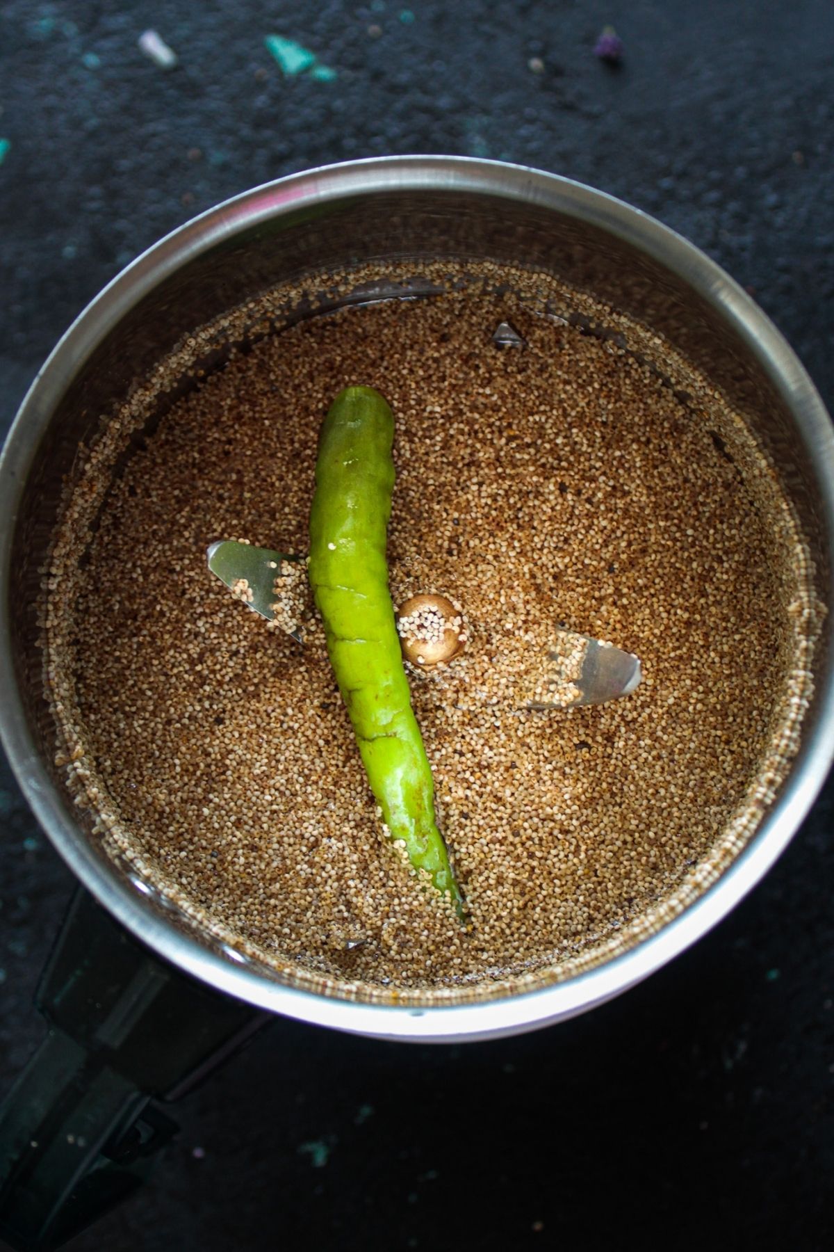 Poppy seeds and chile in chutney grinder