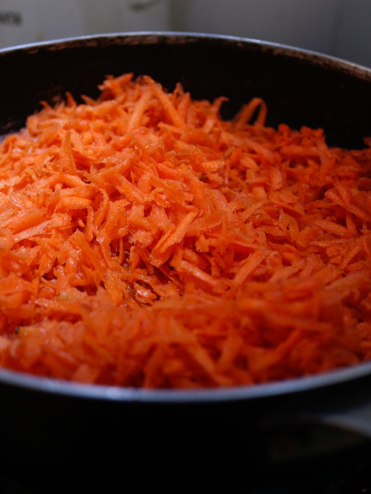 Shredded carrots in large skillet