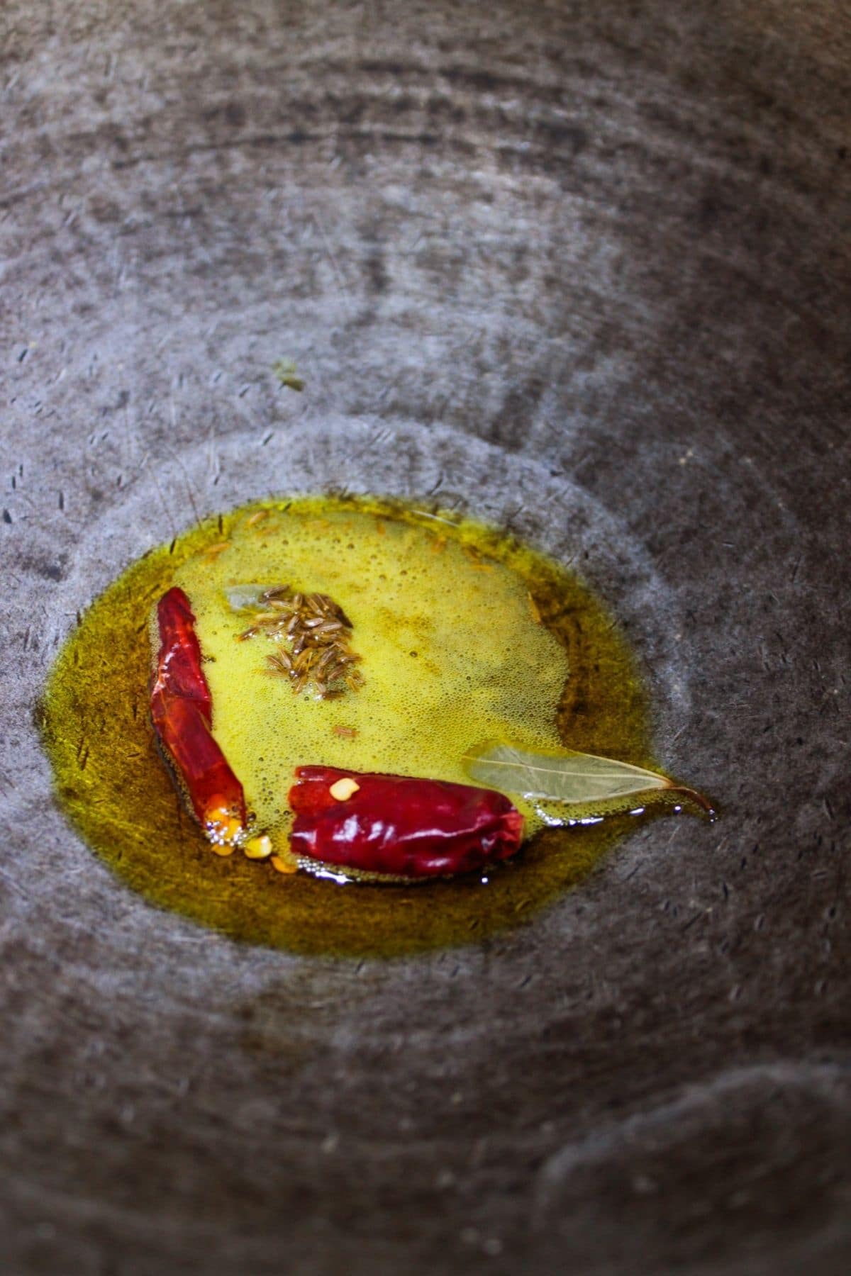 Red chile in oil in skillet