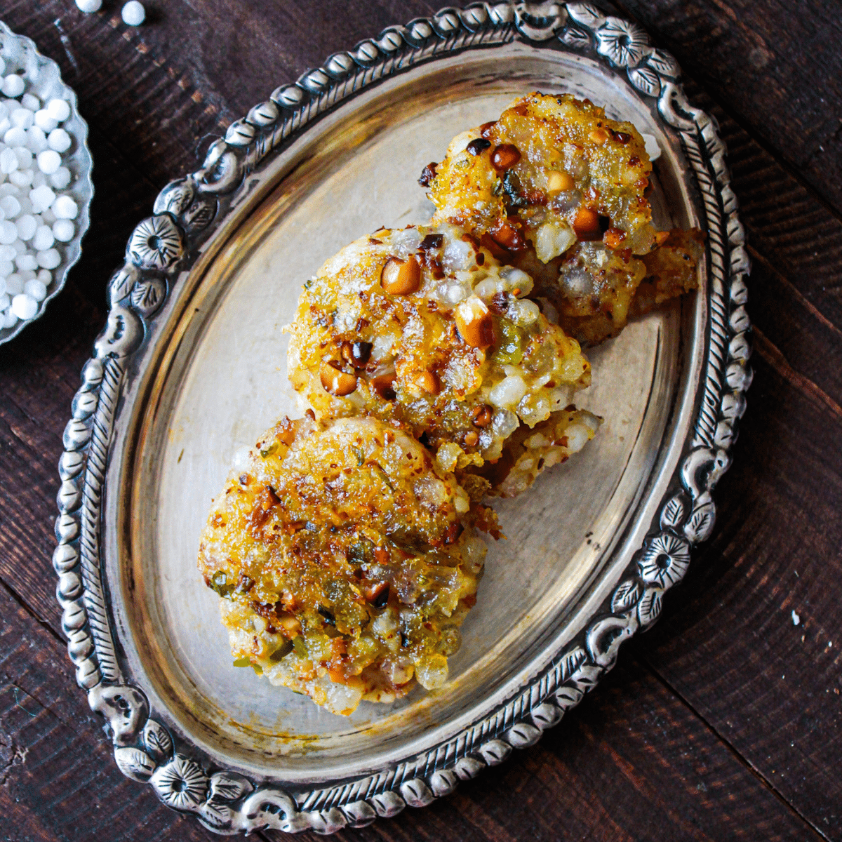 Silver platter of sabudana vada patties