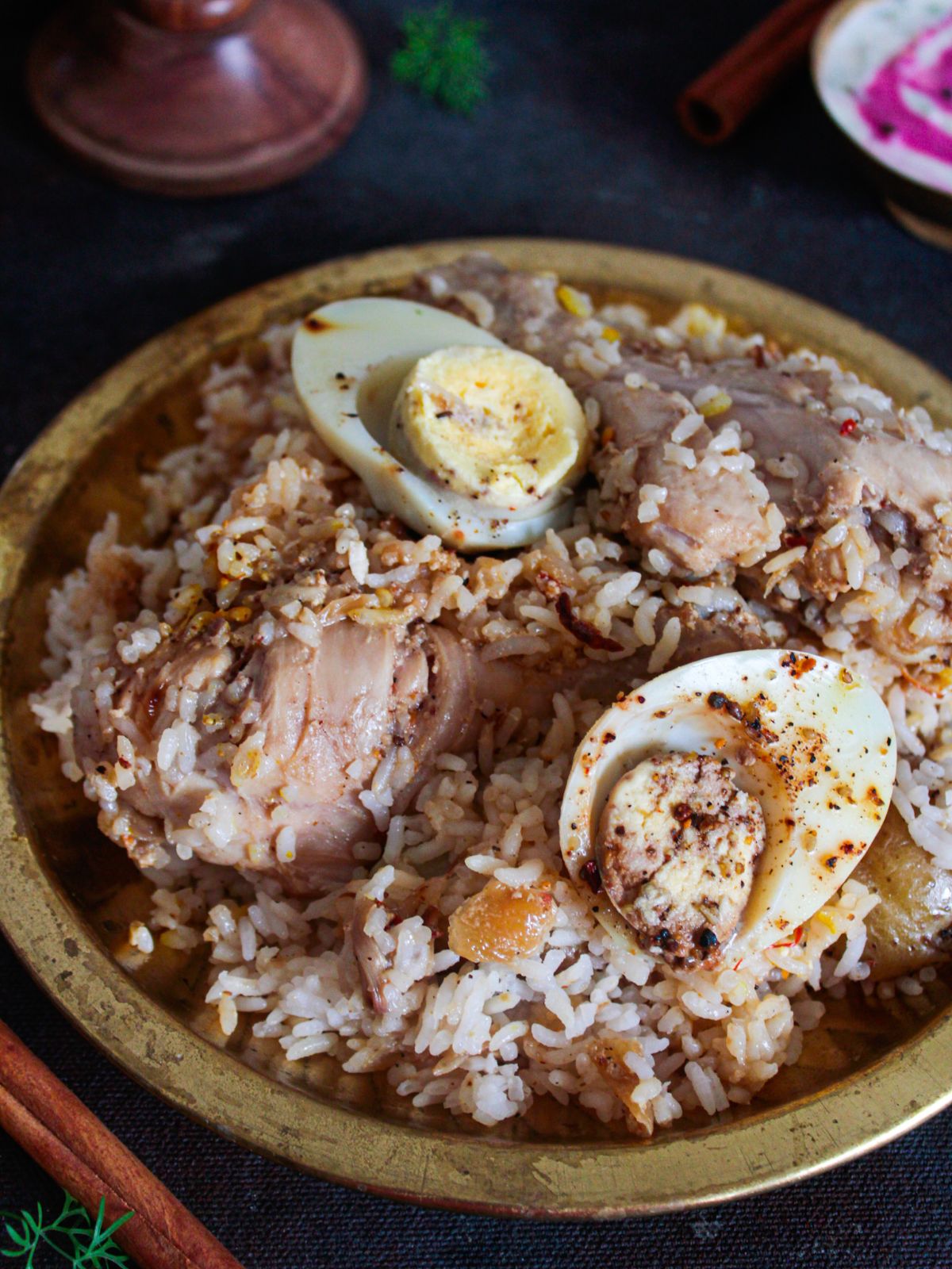 birayni with chicke egg and potato in gold bowl