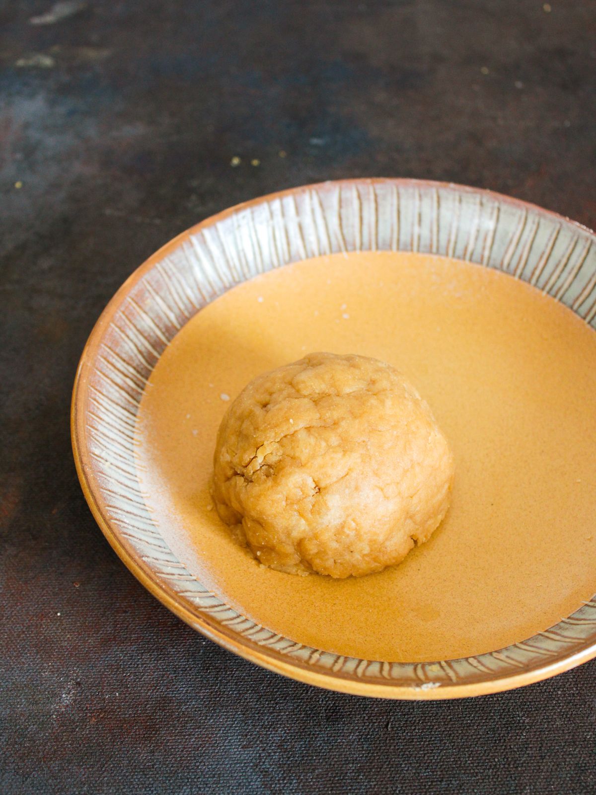Ball of dough on plate